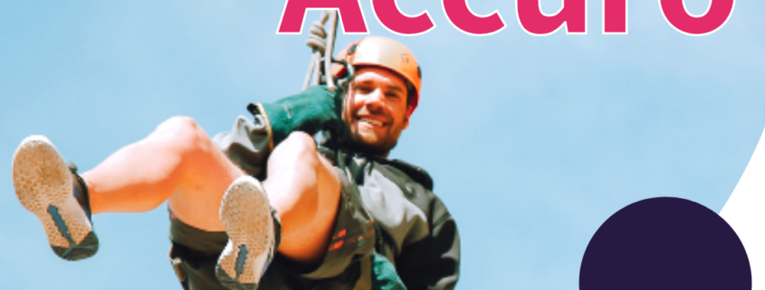 A picture of a man abseiling with Abseil for Accuro written across it