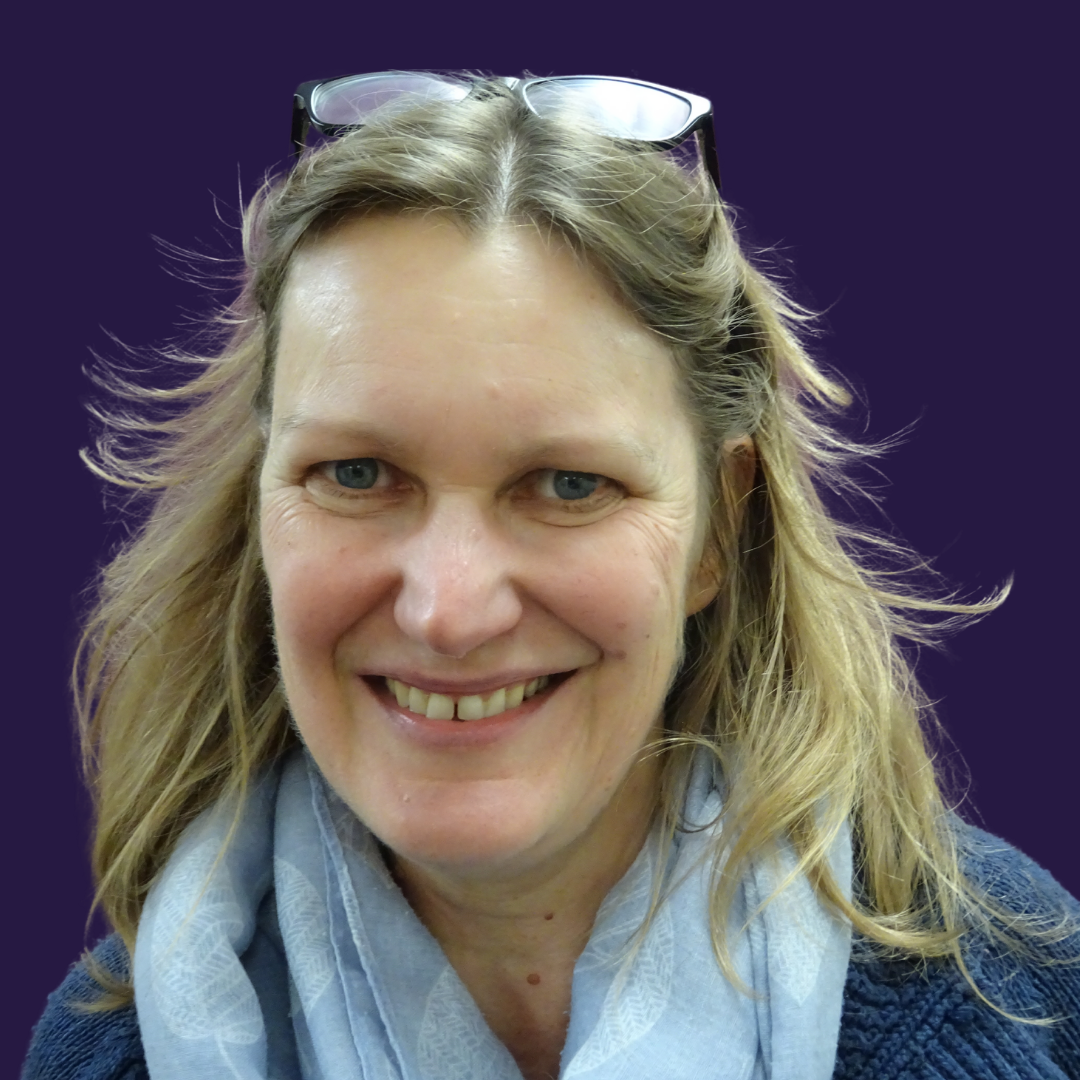 KS Trustree Picture of Karen with a dark purple background
