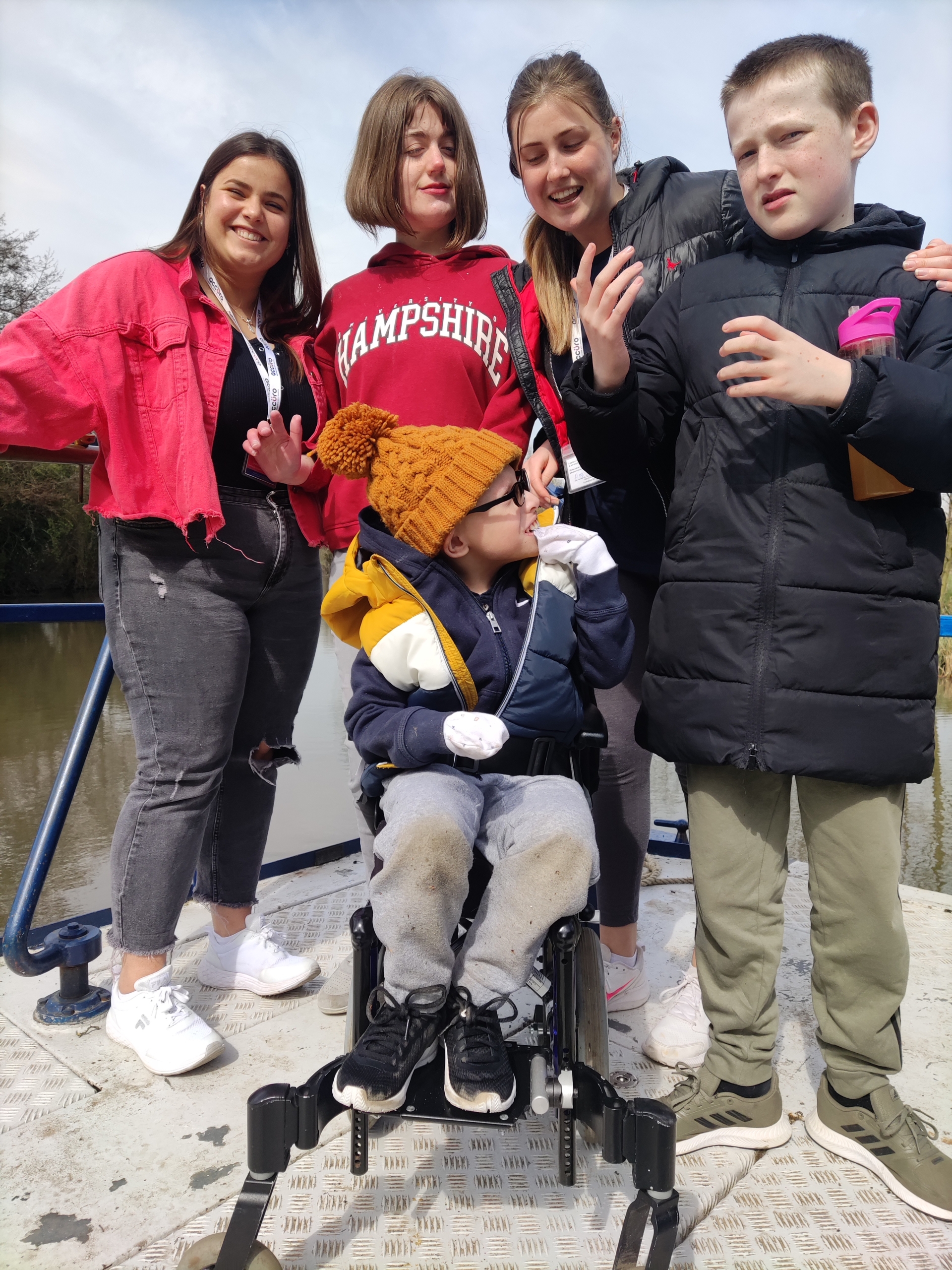 Holiday Scheme members with staff on a canal boat ride with Canalability