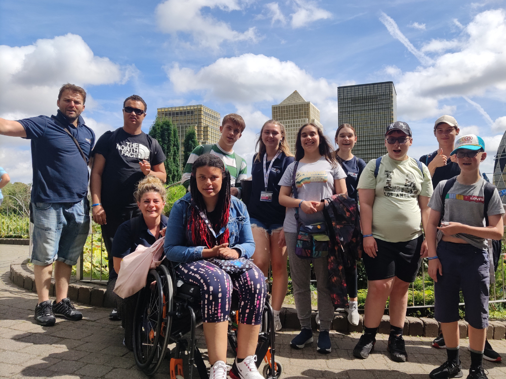 A group of Accuro staff and service users in London in the sunshine.